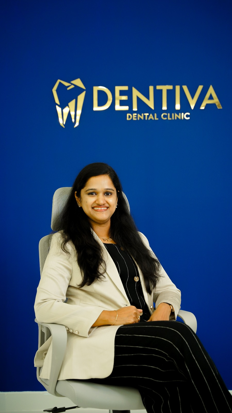Portrait of Dr. Rubymol Ranjith at Dentiva Dental Clinic